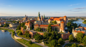 A high-angle, professional editorial photograph of the Royal Wawel Castle in Krakow bathed in golden
