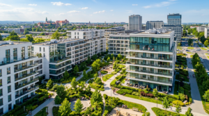 A high-angle, professional editorial shot of modern residential architecture in the Czyżyny district